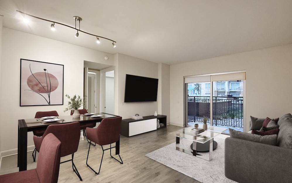 living and dining area with a table and chairs